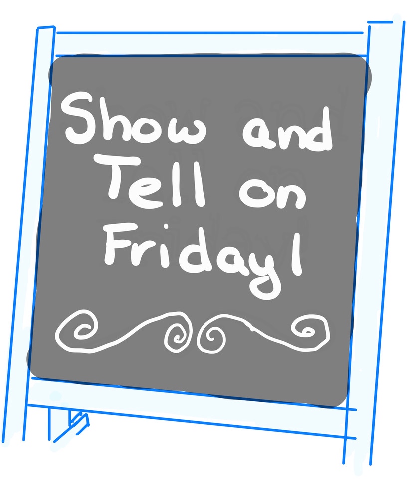 Chalkboard with "Show and Tell on Friday" written on it