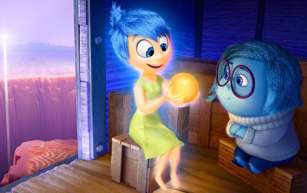 Scene from Inside Out movie. Joy is looking at a memory ball with Sadness